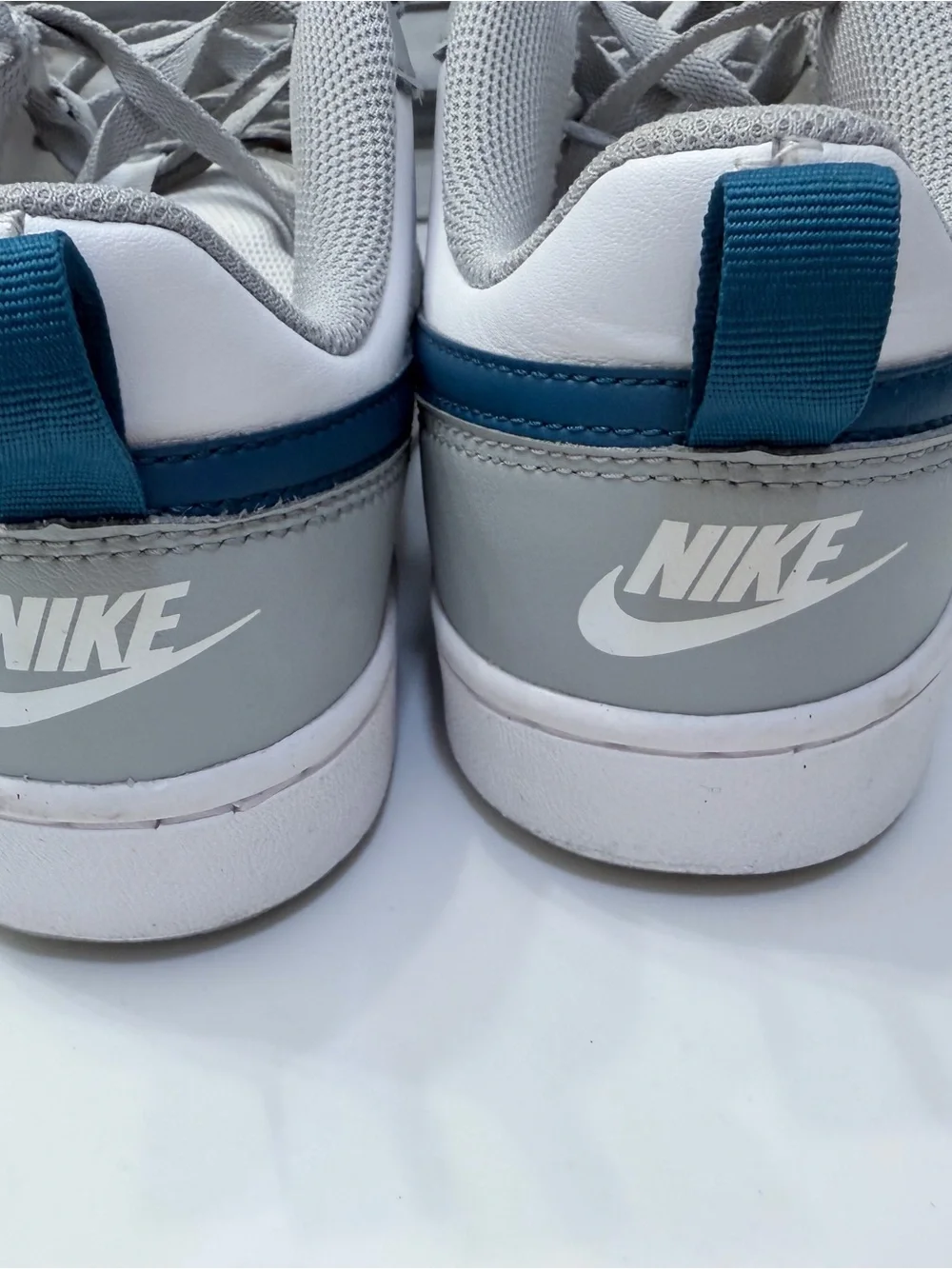 Nike Low-Top Sneakers in White, Gray, and Navy